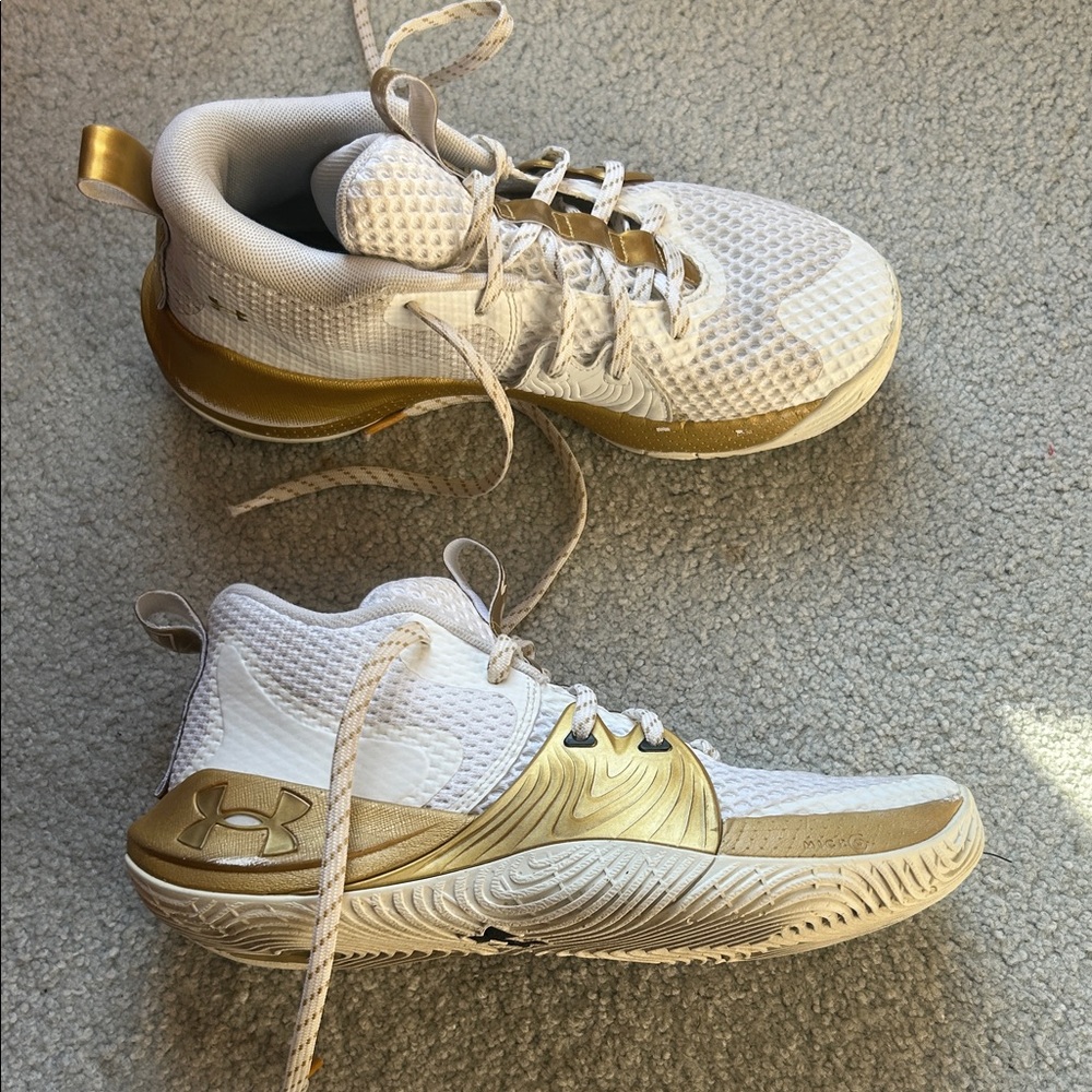 Under Armour Embiid basketball shoes in White and Gold